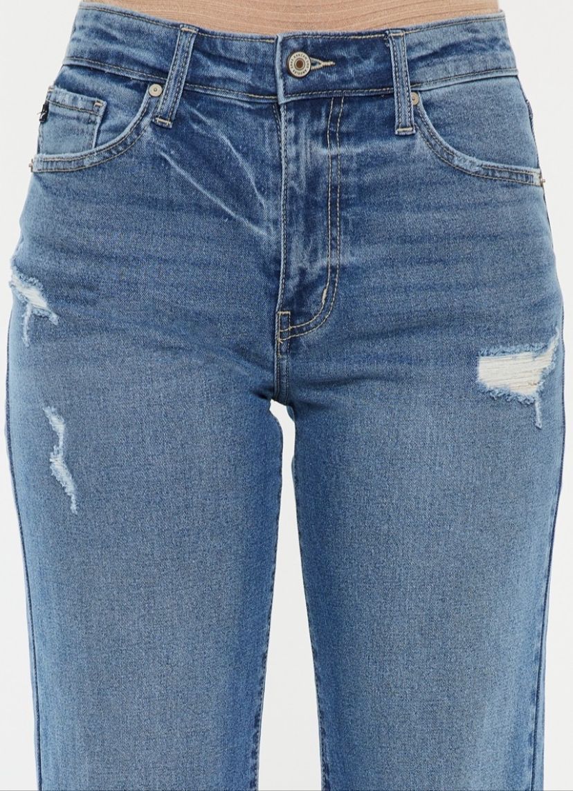 JEANS DE TIRO ALTO Y PIERNA ANCHA BOTA DESHEBRADO
